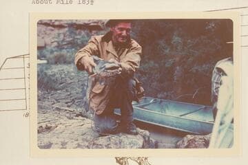 Slim Wilson with a large catfish which he caught in Cataract Canyon. About Mile 183 1/2