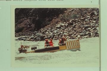 Typical cruising of the Deck-Boat in some moderately heavy water in Dubendorff Rapid. Jim-Bob Rowland was at the wheel with Dock Marston piloting. Jim Jordon wears the bright colored plastic and Shell Wimpfen sits with him