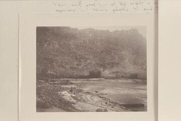 The boat of Charles Smith at the shore at lower right. The two Kolb boats are moored lower center. Cataract CAnyon at the mouth of the stream entering from the left at Mile 206.9