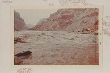 Up near head of Rapid 23. The Sliced Boulder is upper center