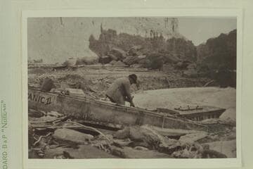 Pulling boats out of river at Badger Creek, the "Titanic" and "Ross Wheeler". Note the ice