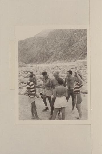 Puzzles at Diamond Creek camp of 1948 Nevills party. Wright in distance; Nevills; Doerr; Masland; Nancy Streator; Garth Marston; Rosalind Johnson