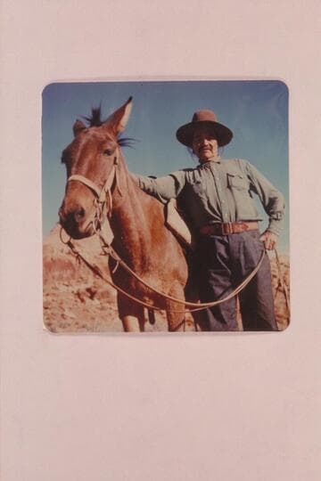 Whitehat and his mule. Chathalgaii. Buck Whitehat served as guide for the 1955 land cruise to Rainbow Bridge and into Navajo Canyon. Whitehat is Navajo