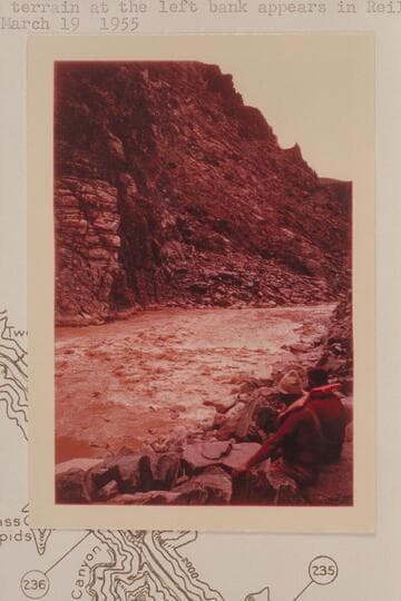 Down to the lower drop in Bridge Canyon Rapid, Mile 235.2. Buzz and Bill Belknap at lower right