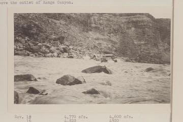 Dean Daily at head of rapid at mile 204.55 in Cataract Canyon. Pathe-Bray party. Copy of print in David C. Lowery collection