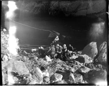 Big Creek 4 construction work: Men hoisting submerged truck out of San Joaquin River